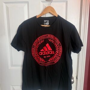 Adidas Men's Black Tee with Red Emblem